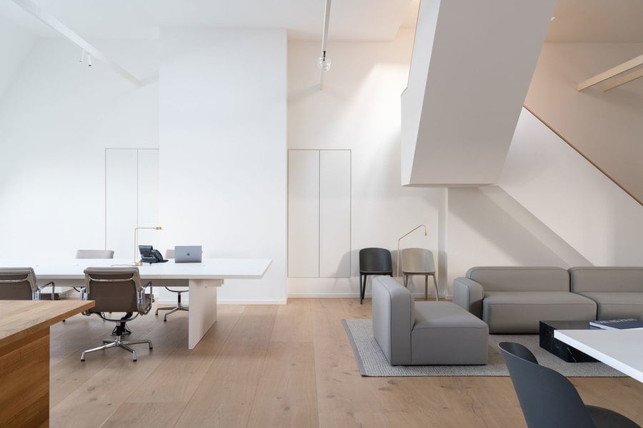 Employees have both desks and lounge areas to work in.