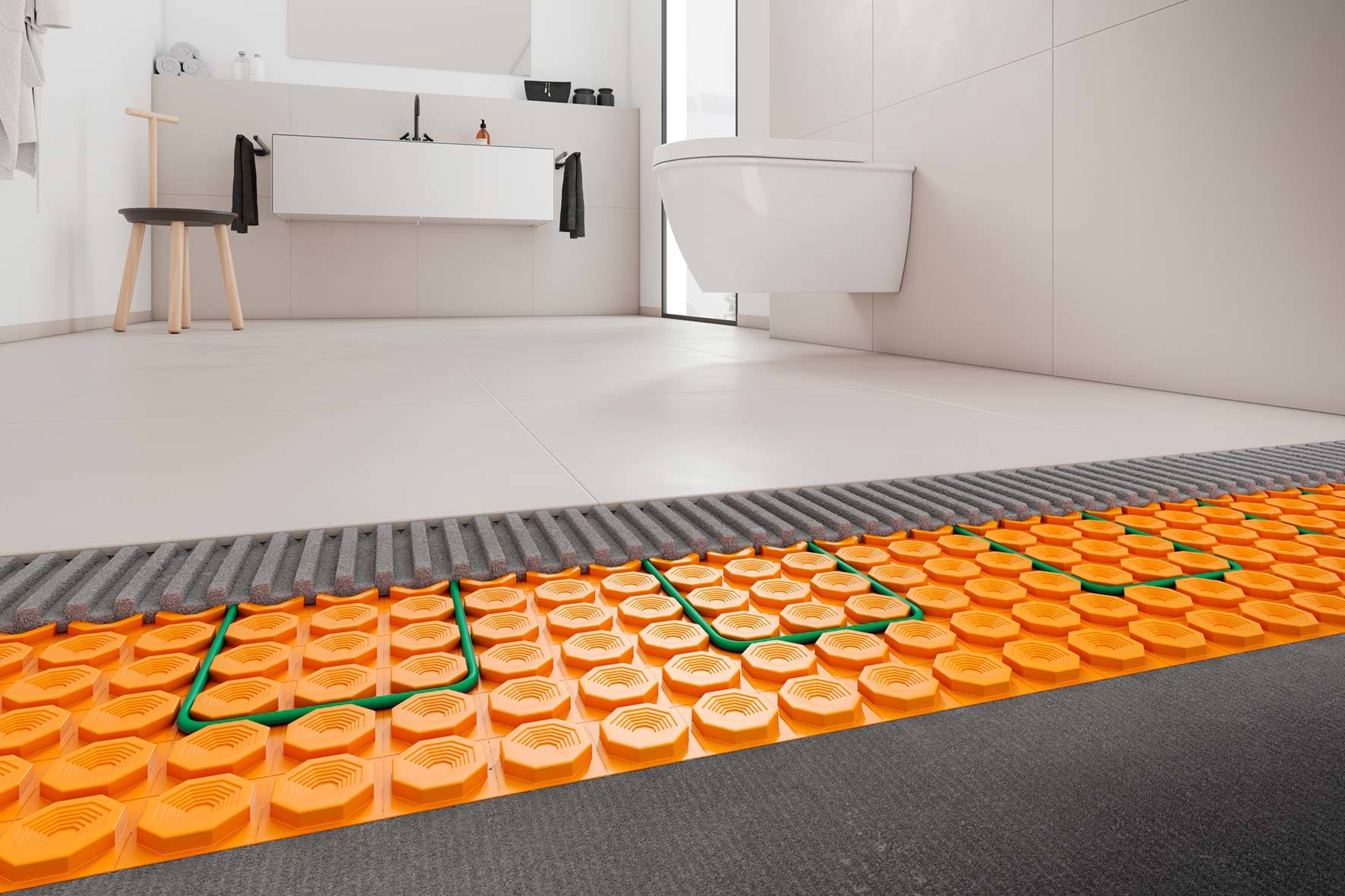 Unter Fliesen und Naturstein wird das Heizsystem DITRA-HEAT-E von Schlüter-Systems unsichtbar.