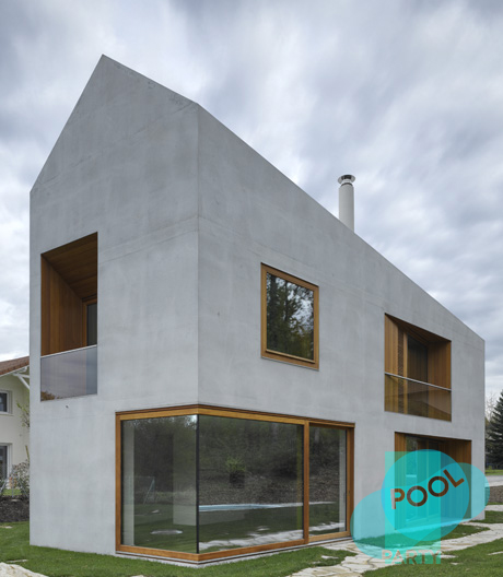 Schweizerisch im besten Sinne: Doppelhaus aus Sichtbeton vom Genfer Büro Clavien Rossier.