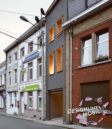 Abgefahren: Wie Architekt Olivier Vitry ein schmales Stadthaus in Belgien zur Einfahrt eines Parkhauses umgebaut hat.